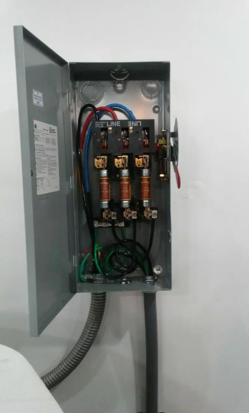 Three-phase disconnect switch installed for Smoke Detector Installation in Woodson Terrace
